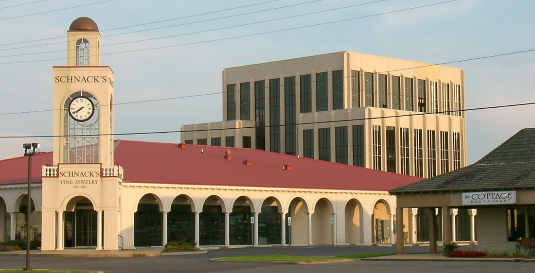 Schnack's Fine Jewelry building with clock tower and arched colonnade